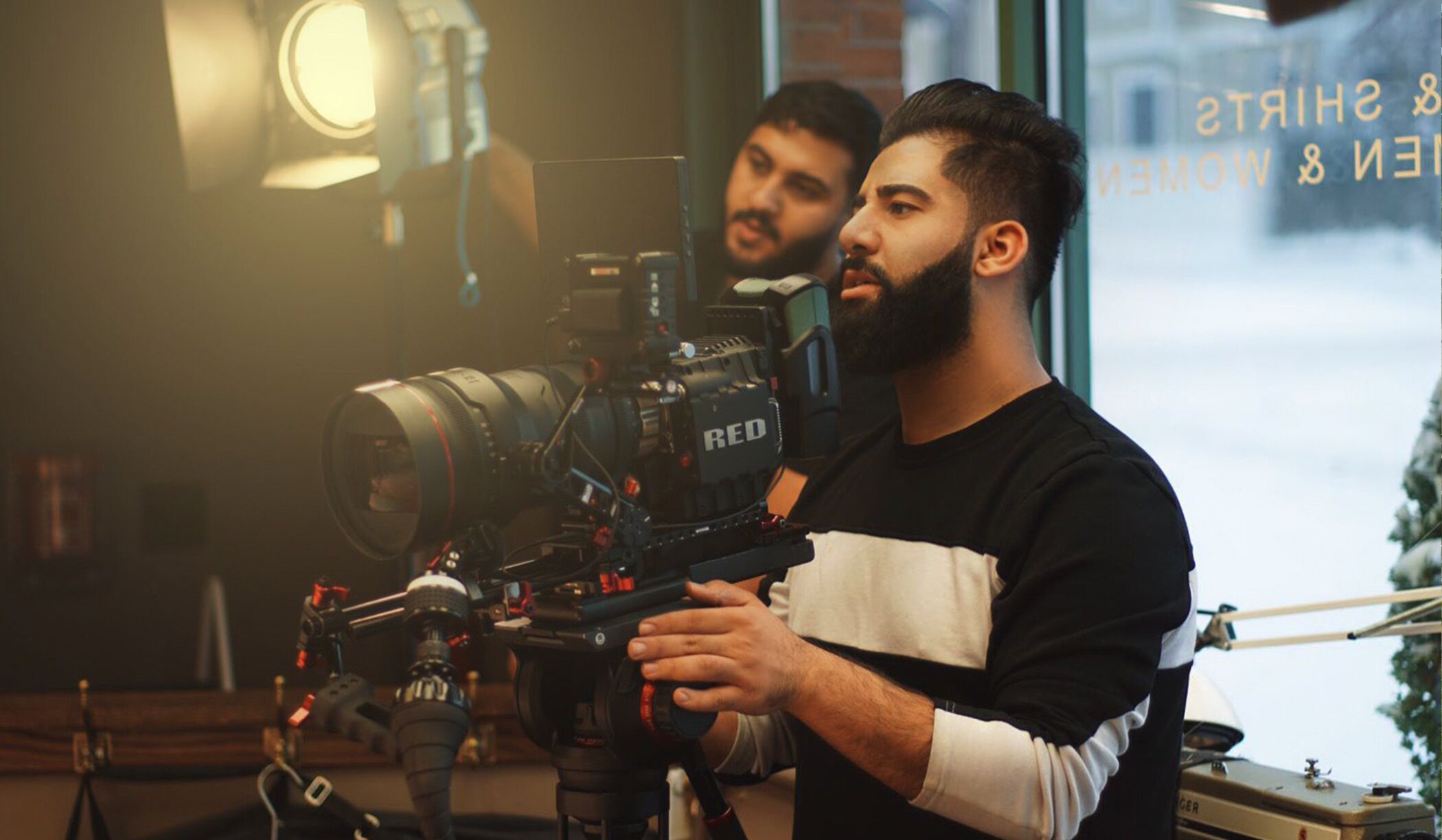 Visual Lion crew operating RED camera on set