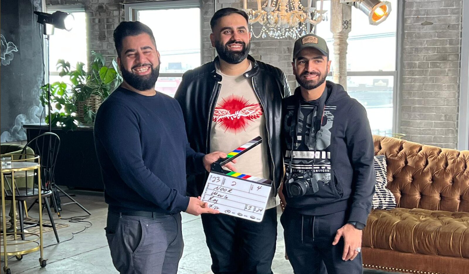 Mohammed and the Visual Lion crew on set between takes